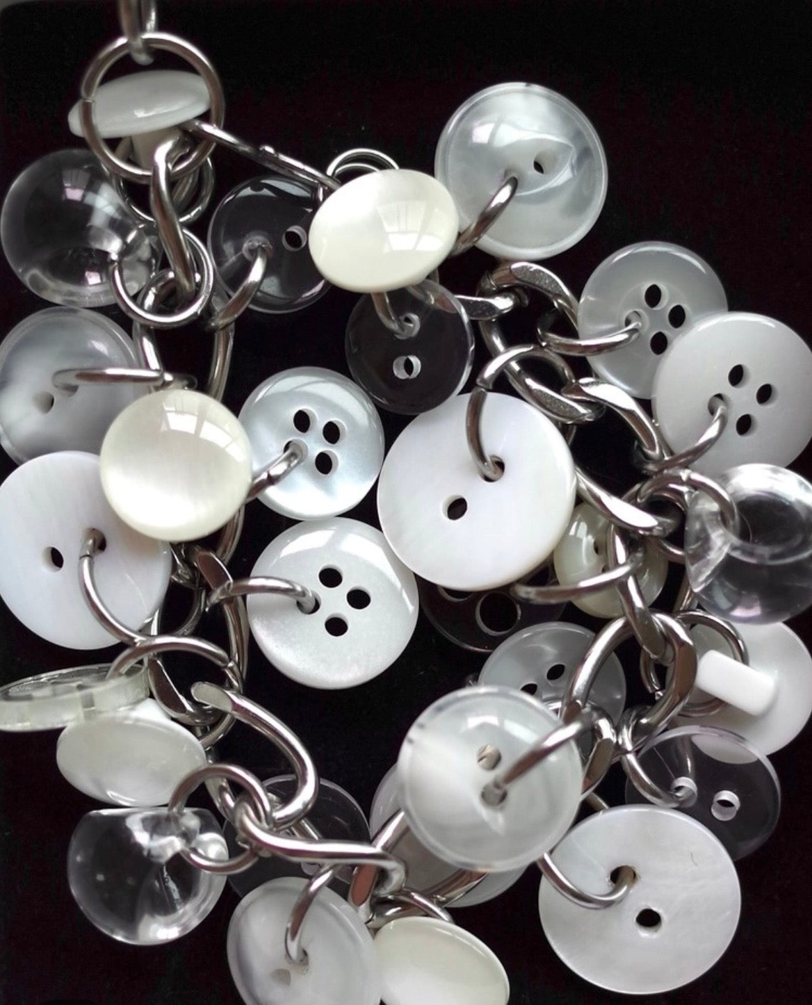 [sacred.] button bras. 1