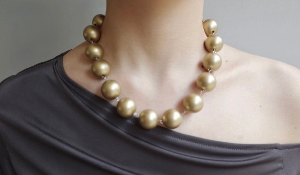 [sacred.] kissed by gold necklace