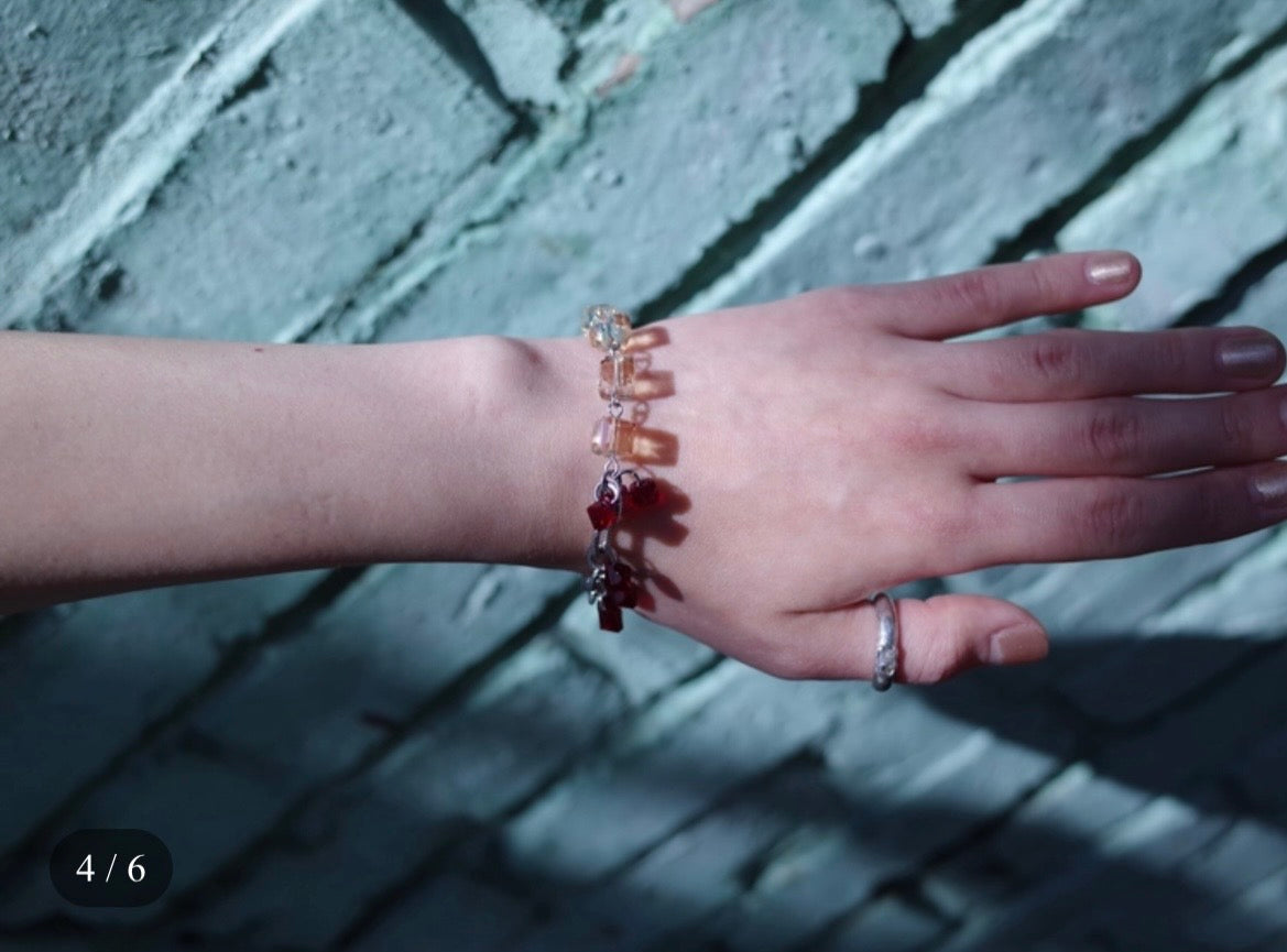 [sacred. ] clear drops bracelet tangerine ruby
